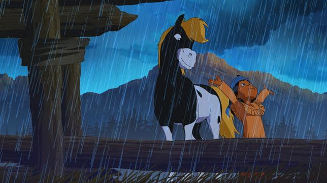 Yakari und sein Pony Kleiner Donner genießen den Regen.