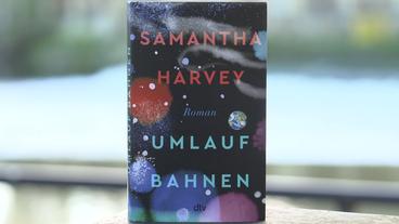 Buchcover mit Schrift "Umlaufbahnen" von Samantha  Harvey